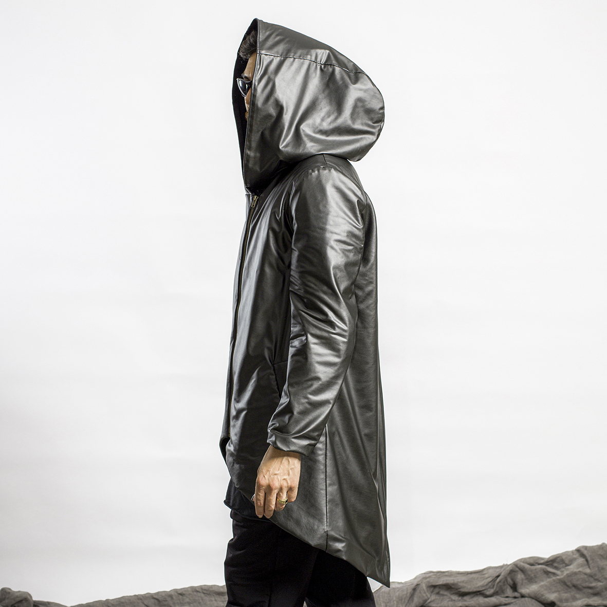 Stylish black leather hooded jacket with asymmetrical zipper